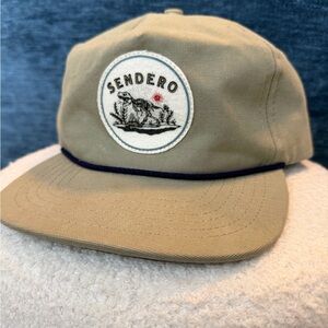 Sendero Provisions Tan Hat with Dinosaur Logo Patch
